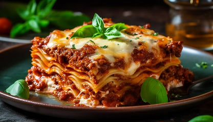Foundation Outdoors lasagna meal featuring layered pasta, cheese, and rich tomato sauce in a ready-to-eat meal presentation.