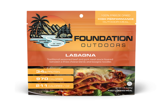 Foundation Outdoors lasagna meal pouch showing a prepared lasagna with cheese and sauce in a resealable pouch.