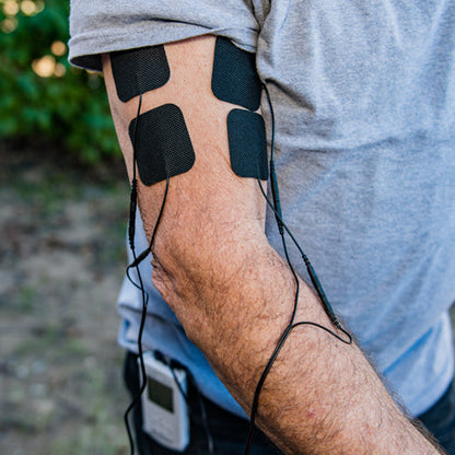 iReliev wired small pads refill kit with multiple adhesive pads and connectors, designed for use with compatible pain relief devices.
