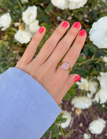 Lilac enamel cross ring by Elevated Faith featuring a detailed metal band and a colorful lilac cross design on top.