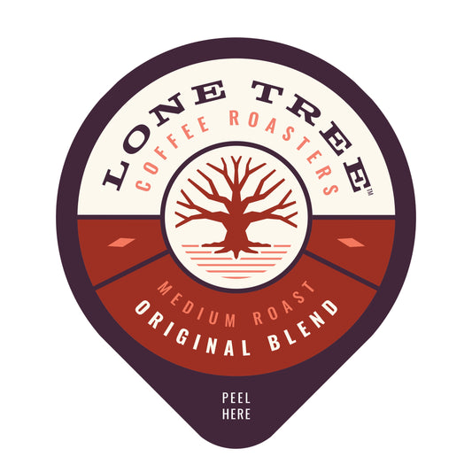 Java House Lone Tree Coffee Roasters medium roast original blend in a bag with coffee beans and label, ready for brewing.