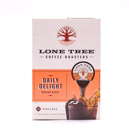 Medium roast coffee bag from Lone Tree Coffee Roasters, Daily Delight blend by Java House, with a brown and beige packaging design.