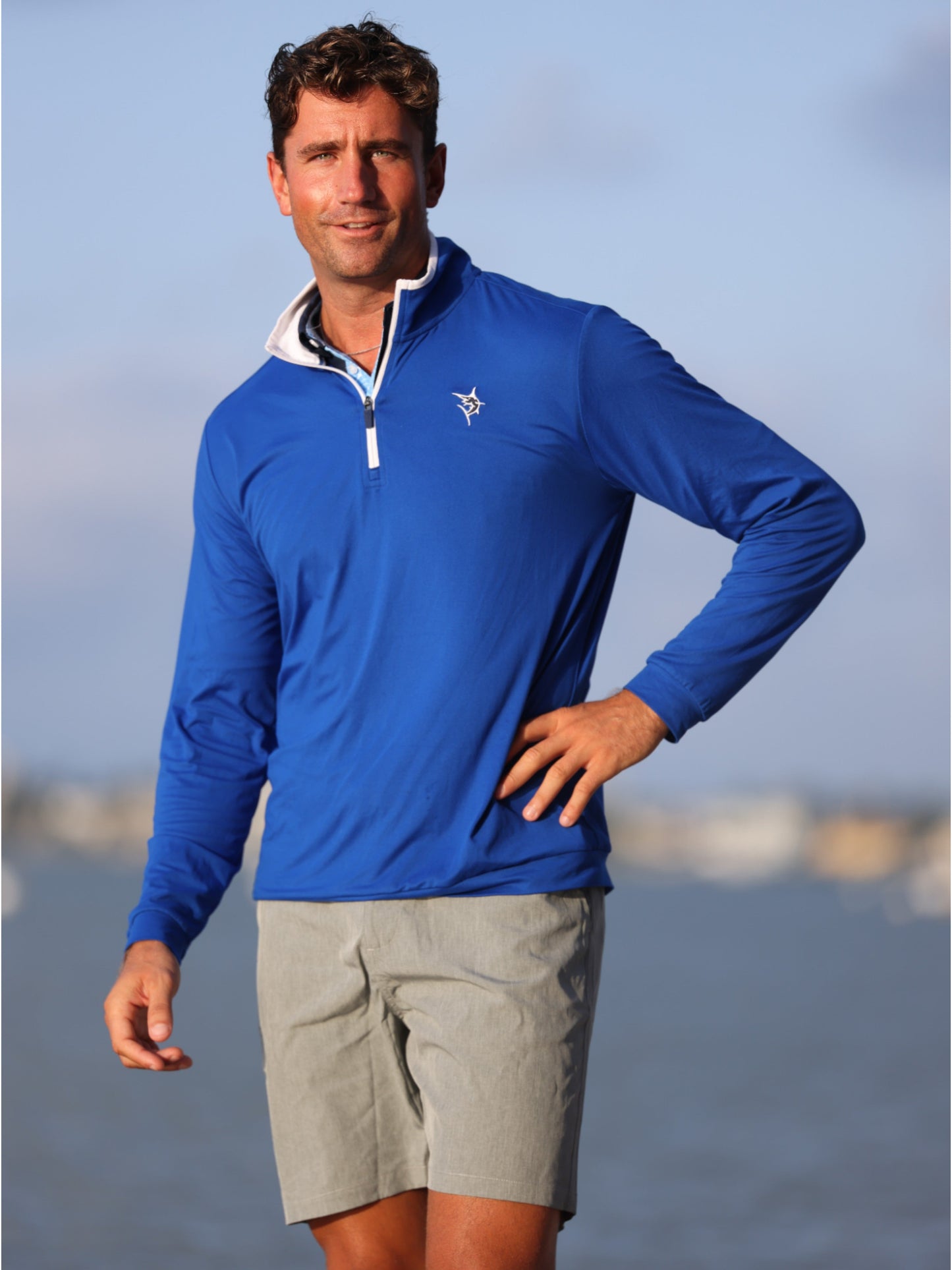 White Water Life Long Beach royal quarter zip long sleeve top made of ultra-soft, lightweight fabric, shown on a model.