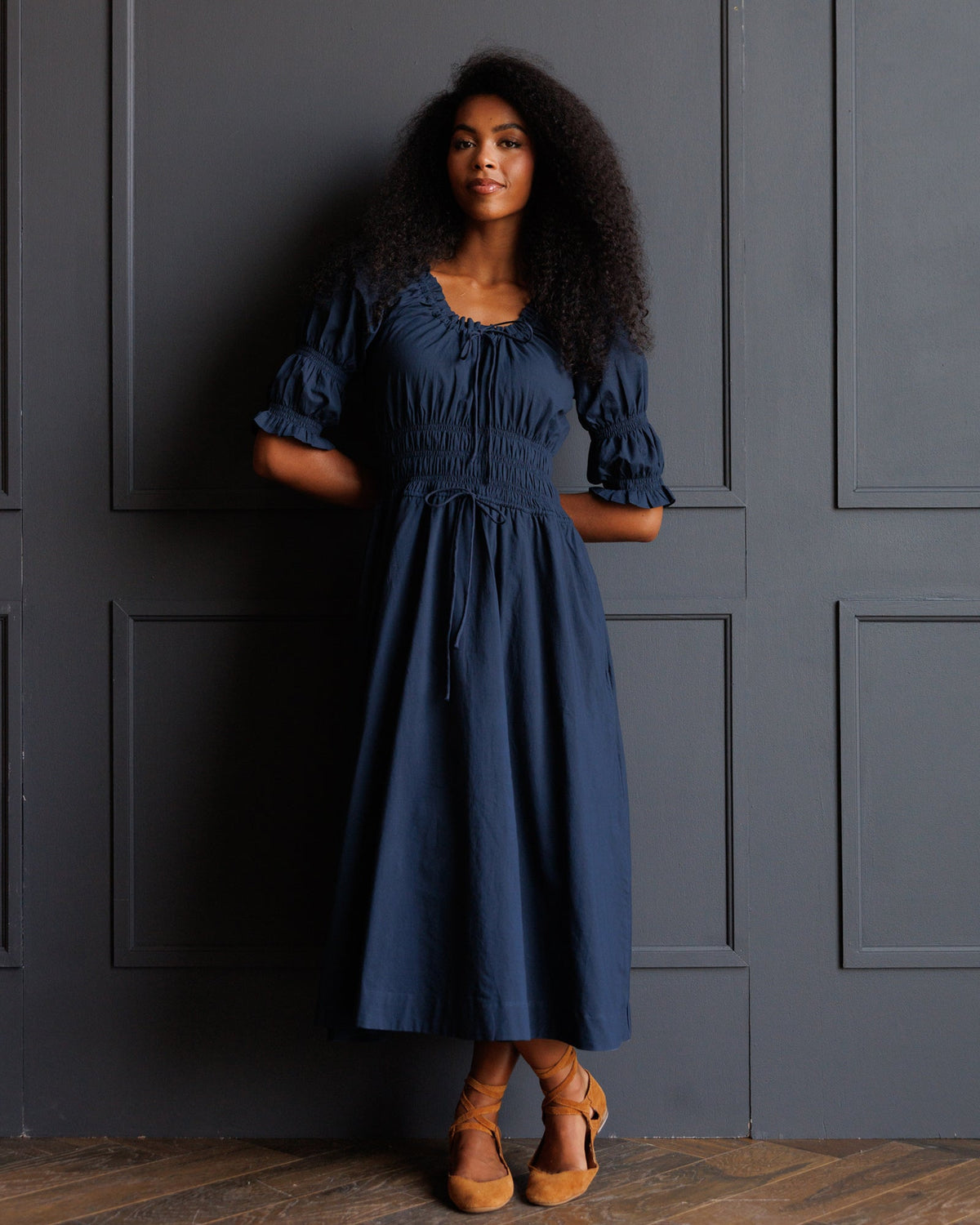 Blue Long Way Home Dress by Downeast, featuring a flowing design and long sleeves, perfect for casual or dressy occasions.