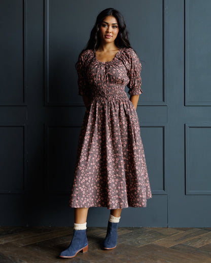 Downeast Long Way Home Dress shown on a model, featuring a flowy silhouette, long sleeves, and a casual, comfortable style.