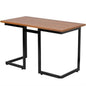 Modern black metal frame computer desk with cherry wood finish top, sturdy workspace for home or office use.