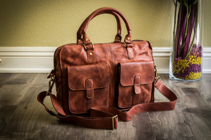 Kiko commuter briefcase made of durable bags material, featuring a sleek design with handles and a shoulder strap for versatile carrying.