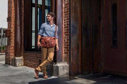 Kiko commuter briefcase made of durable black bags material with handles and a shoulder strap, suitable for everyday office use.