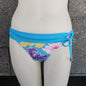 Loco Boutique Lucy Folded Over product with a close-up of the fabric and design details.