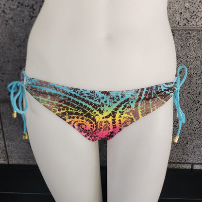 Loco Boutique bandana with keyhole gather design featuring vibrant colors and stylish pattern, ideal for accessories or headwear.