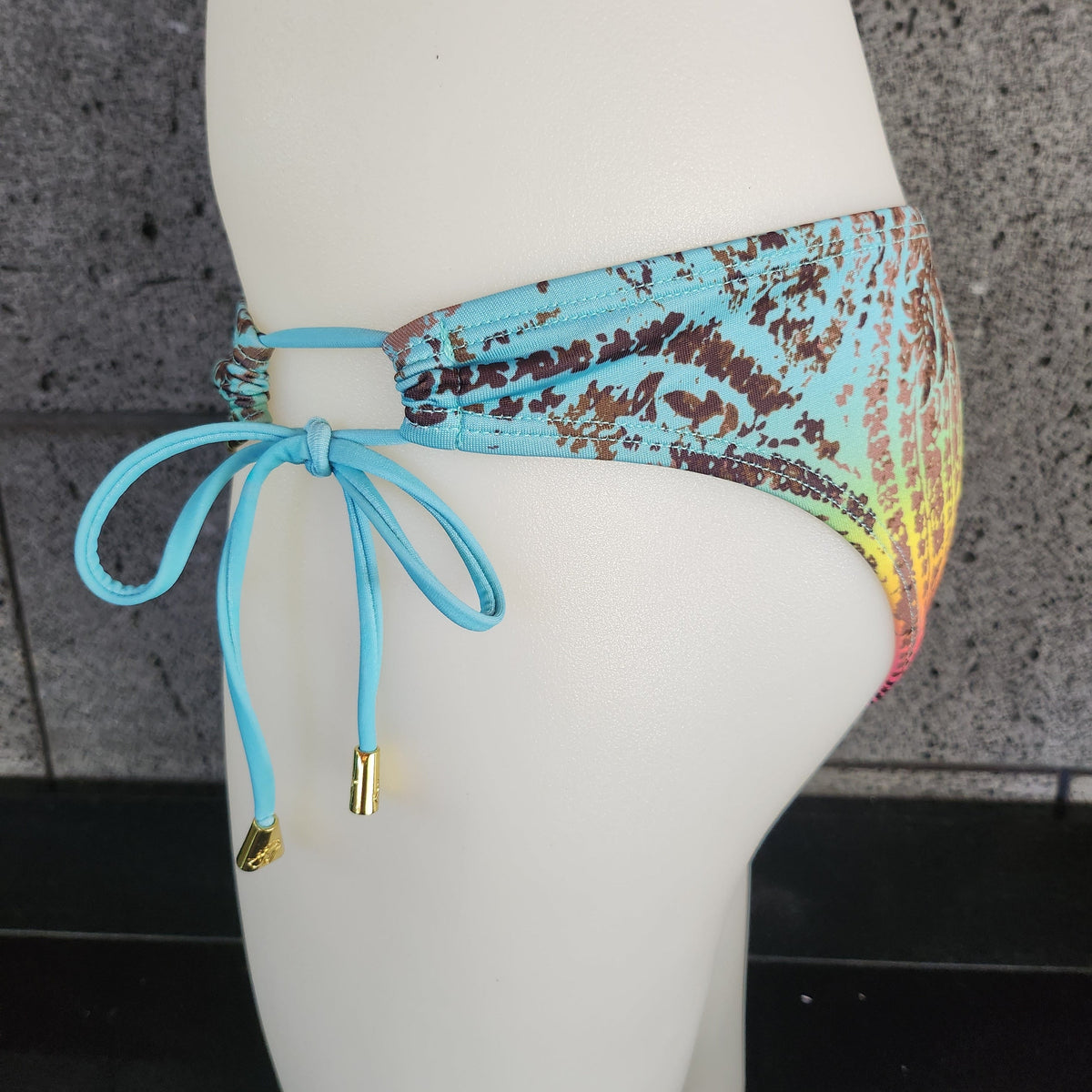 Loco Boutique bandana with a keyhole gather design featuring vibrant colors and stylish pattern, perfect accessory or headscarf.