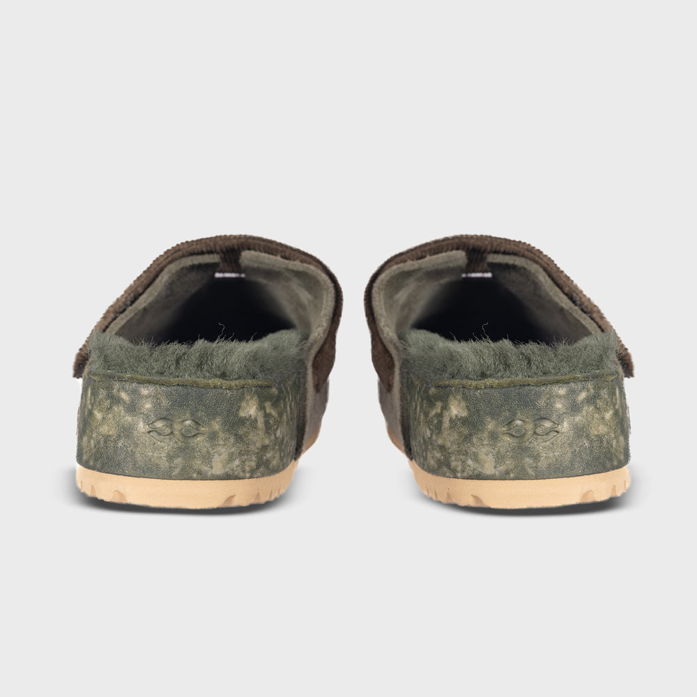Fleks San Ysidro slide sandal, The Puente Clog in Forest color, featuring a comfortable slip-on design with earthy green tones.