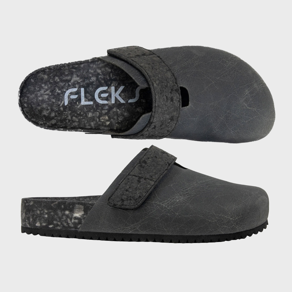 Fleks More Mesa Clog in After Dark color, stylish slip-on footwear with a textured sole, shown from a standard side view.
