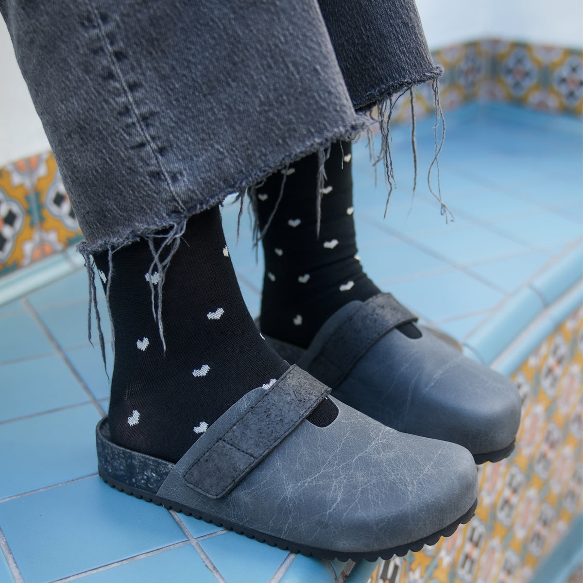 Fleks More Mesa Clog in After Dark color, showcasing a stylish, comfortable slip-on shoe with a textured sole and sleek design.