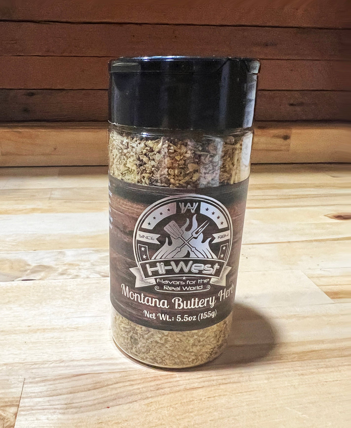 Hi-West Montana Buttery Herb Seasoning in a spice jar, showcasing the seasoned blend with herbs and butter flavor for cooking.