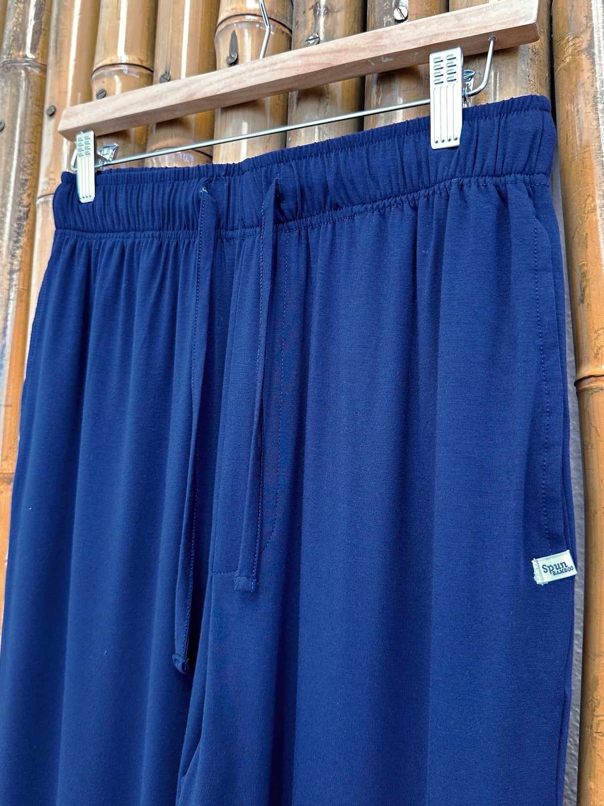 Men's navy bamboo viscose lounge pants by Spun Bamboo, showing side view of soft, comfortable pajama pants for men.