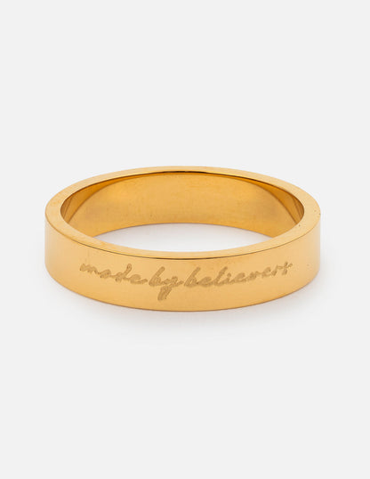Elevated Faith Made by Believers ring featuring a sleek silver band with engraved inspirational design.