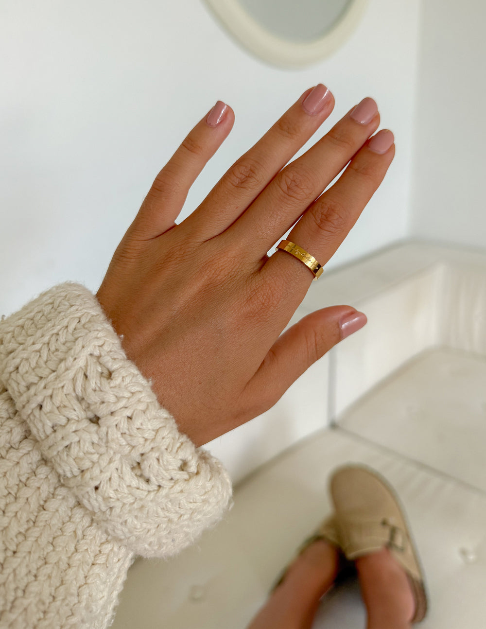 Elevated Faith Made by Believers ring featuring a sleek band with engraved religious symbols and inspirational design.