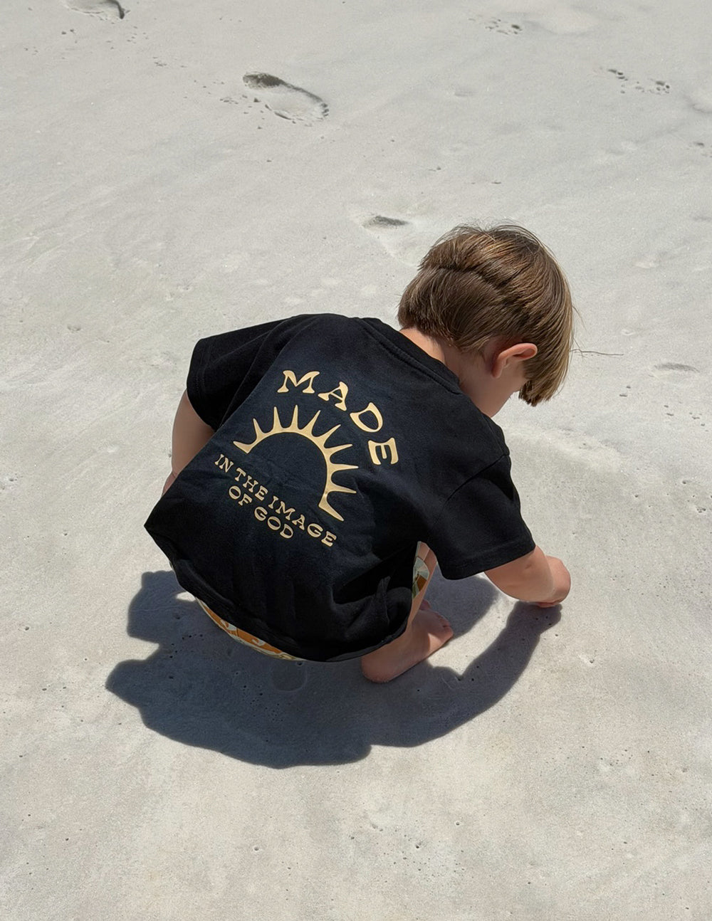 Kids T-shirt by Elevated Faith featuring a design inspired by the image of God, made for children with inspiring artwork.