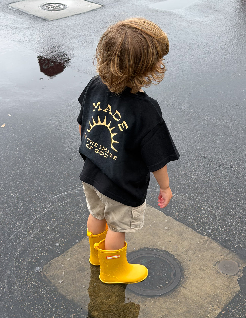 Bright kids' T-shirt by Elevated Faith featuring the "Made in the Image of God" design, comfortable cotton fabric for children.