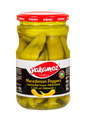 Glass jar of Yakamoz Macedonian pickles with spicy red pepper from S101, showcasing colorful pickled peppers in a clear jar.