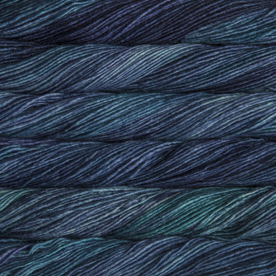 Darn Good Yarn Malabrigo Silky Merino yarn in soft, vibrant colors, showcasing its smooth, luxurious texture for knitting or crochet projects.