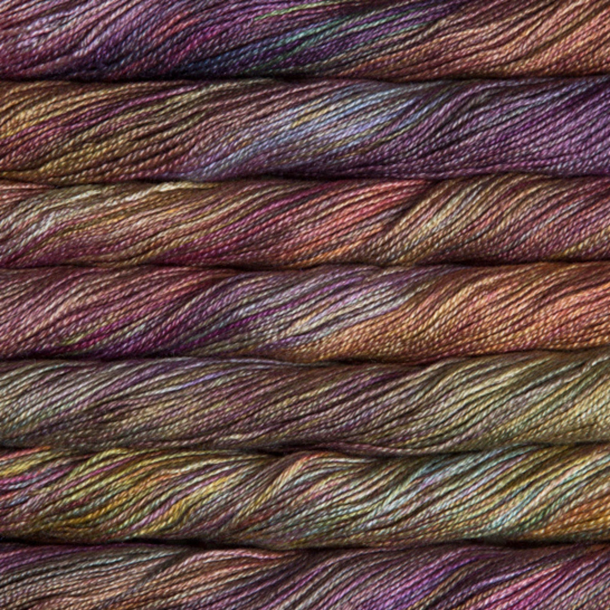 Soft Malabrigo Mora yarn from Darn Good Yarn in vibrant, hand-dyed colors, showcasing its rich texture and smooth fibers.