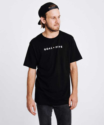Men wearing Goal Five men's black cotton T-shirt in a lifestyle setting, showcasing casual comfort and stylish fit.