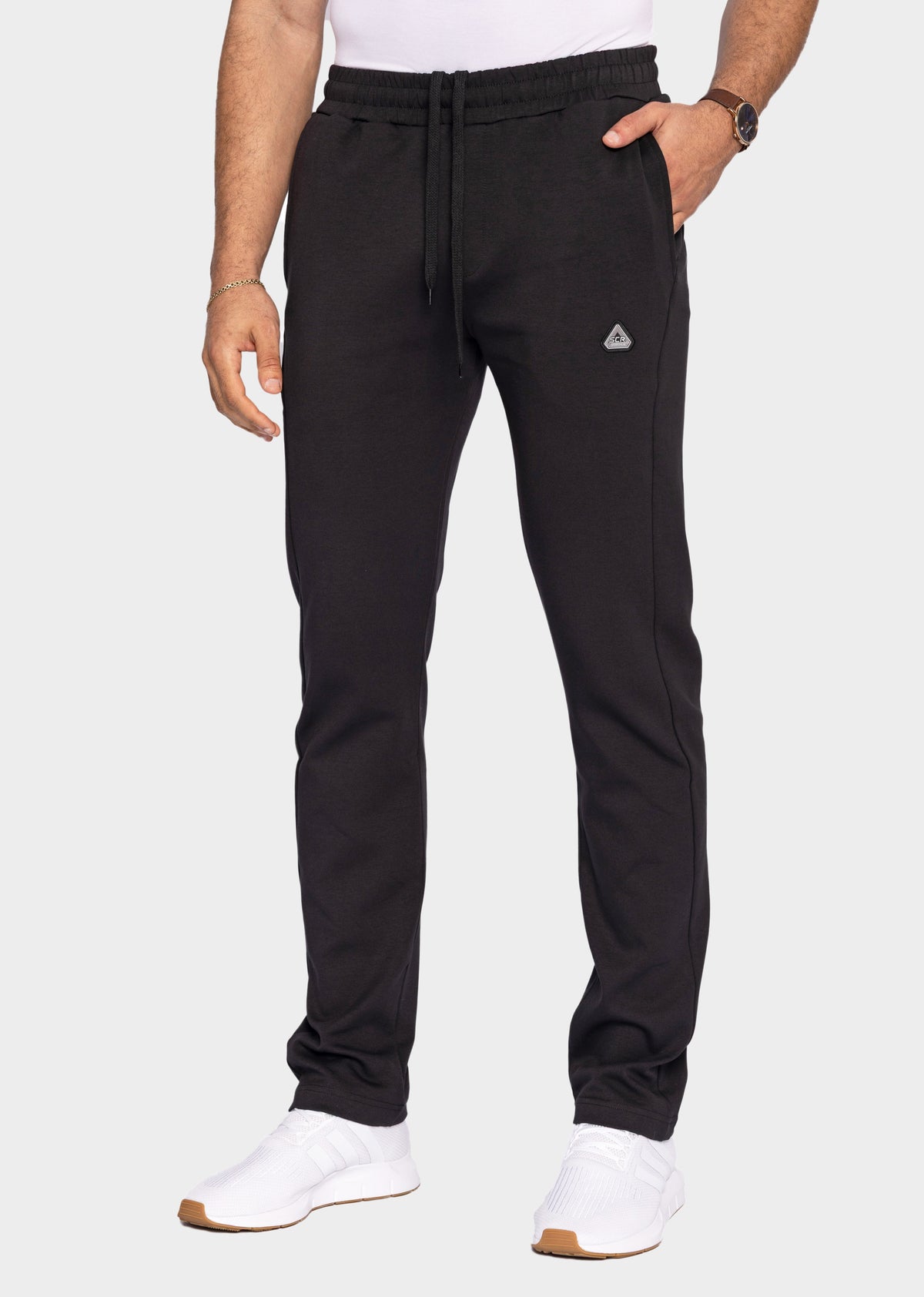 Men's black tapered athleisure sweatpants by SCR Sportswear, tall fit, with 36-inch inseam, designed for activewear and comfort.