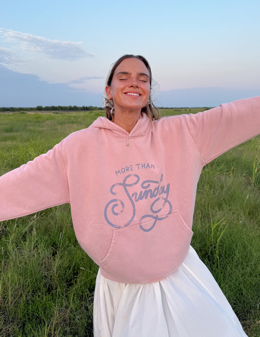 Unisex hoodie from Elevated Faith with "More Than Sunday" printed design, casual fit, and soft fabric in a relaxed style.