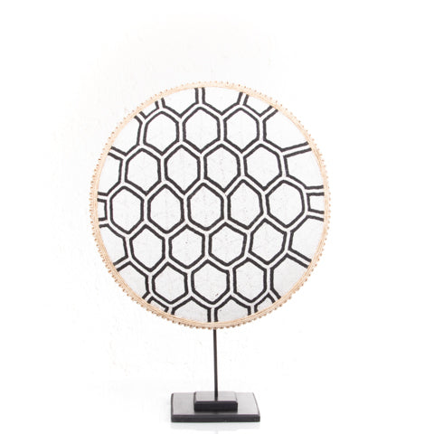 Beaded Cameroon shield with black and white hexagon light design on stand, decorative home decor piece by Luangisa.