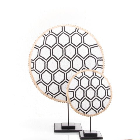 Beaded Cameroon shield in black and white with hexagon light design on stand, home decor by Luangisa.