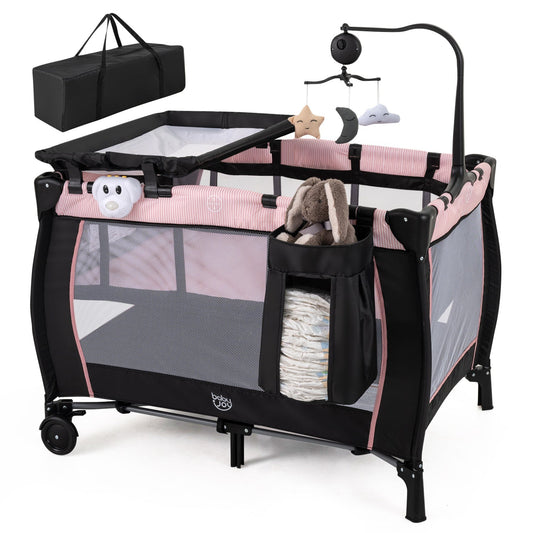 Pink baby playpen with changing table and bassinet, featuring safety rails and soft padding for infants and toddlers.