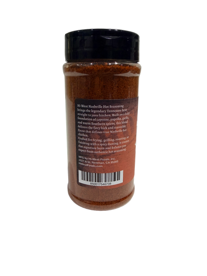 Close-up of Hi-West Nashville Hot Seasoning jar showing the spicy, vibrant seasoning blend in a clear container.