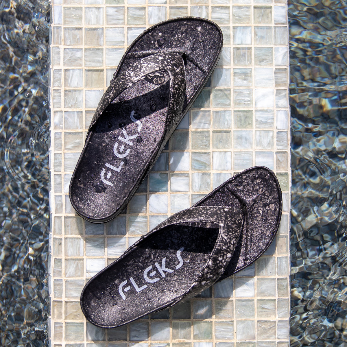 Fleks West Beach Flip Flop in Night color, featuring casual slip-on design with textured sole for comfortable beachwear.