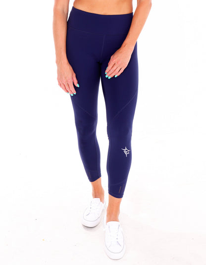 White Water Life HydroFlex cut out leggings featuring a sleek design and breathable fabric, shown in navy with cutout details.