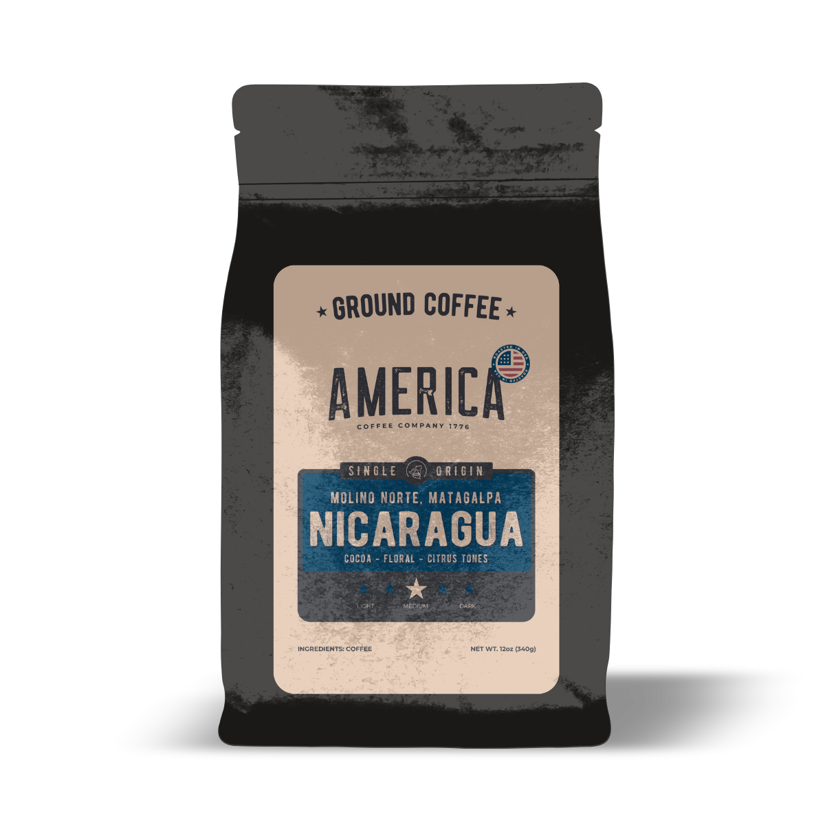 Ground Nicaragua single origin coffee from America Supply Company LLC, showing a bag of freshly ground coffee beans.