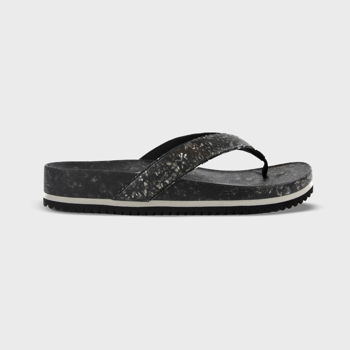 Fleks West Beach Flip Flop in Night color, side profile view showing the casual sandal with strap and sole.