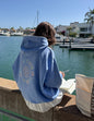 Unisex hoodie by Elevated Faith featuring a cosmic or extraterrestrial-inspired design on soft fabric.