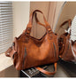 Large capacity CD single-shoulder crossbody tote bag for women, stylish commuter handbag with spacious interior.