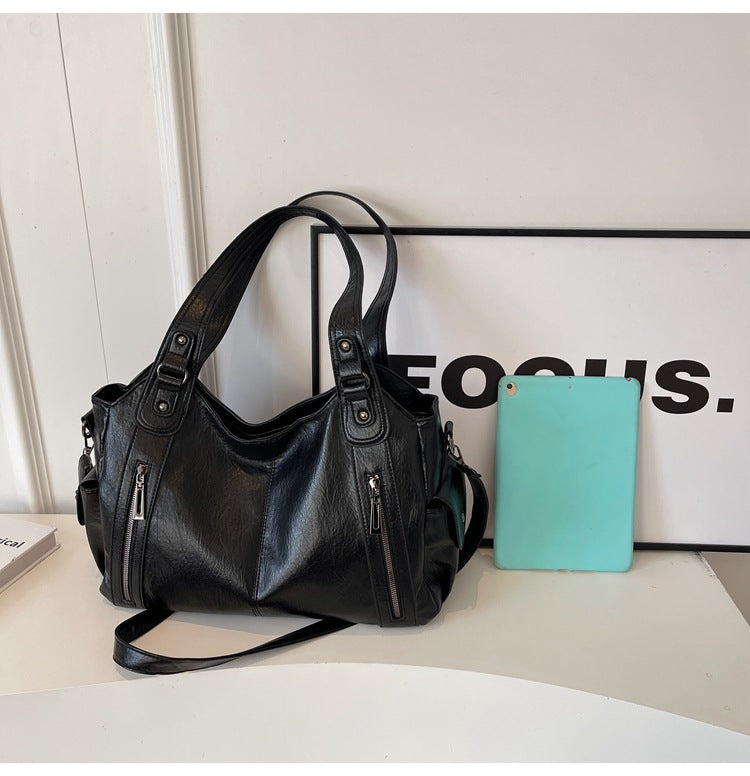 Large capacity CD single-shoulder crossbody tote bag for women, stylish commuter handbag with spacious interior.