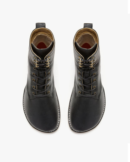 Black women's adventure-style barefoot shoes from Origo Shoes, showing the flexible, lightweight design and casual slip-on style.