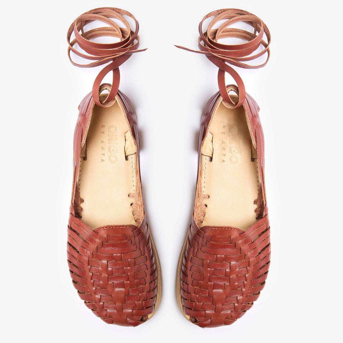 Origo Shoes Huarache Slip-On barefoot shoes featuring a sleek design and breathable material, ideal for comfortable casual wear.