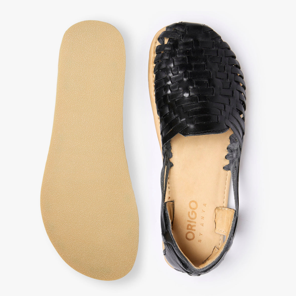 Origo Shoes Las Huarache Slip-On in black, casual barefoot sandals with open-toe design and woven straps for a relaxed look.