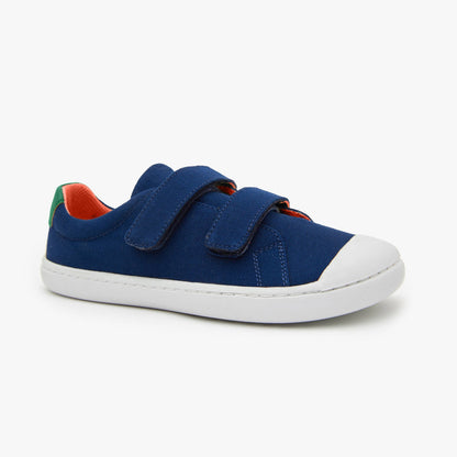 Blue kid's barefoot shoes with hook and loop closure from Origo Shoes made of durable cotton canvas, designed for comfort and easy wear.