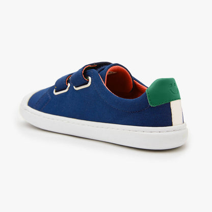 Blue cotton canvas barefoot shoes for kids with hook and loop straps by Origo Shoes, designed for comfort and natural movement.