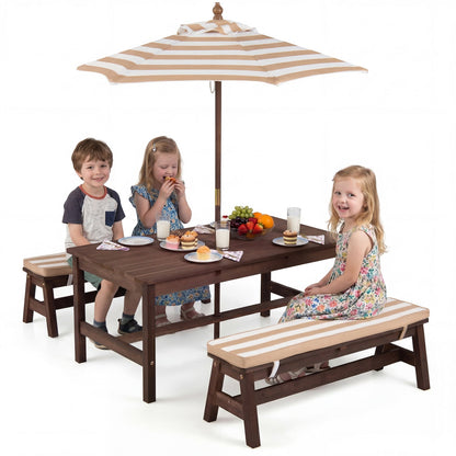 Outdoor wooden kids picnic table with removable umbrella and cushions, designed for outdoor play and family gatherings.
