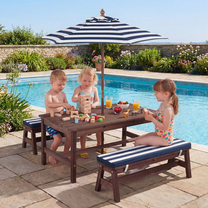 Wooden kids picnic table with removable umbrella and cushions, ideal for outdoor play and family gatherings.
