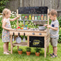 Wooden outdoor mud kitchen for kids with sink and stoves, brand GBruno Store, featuring realistic play kitchen accessories.