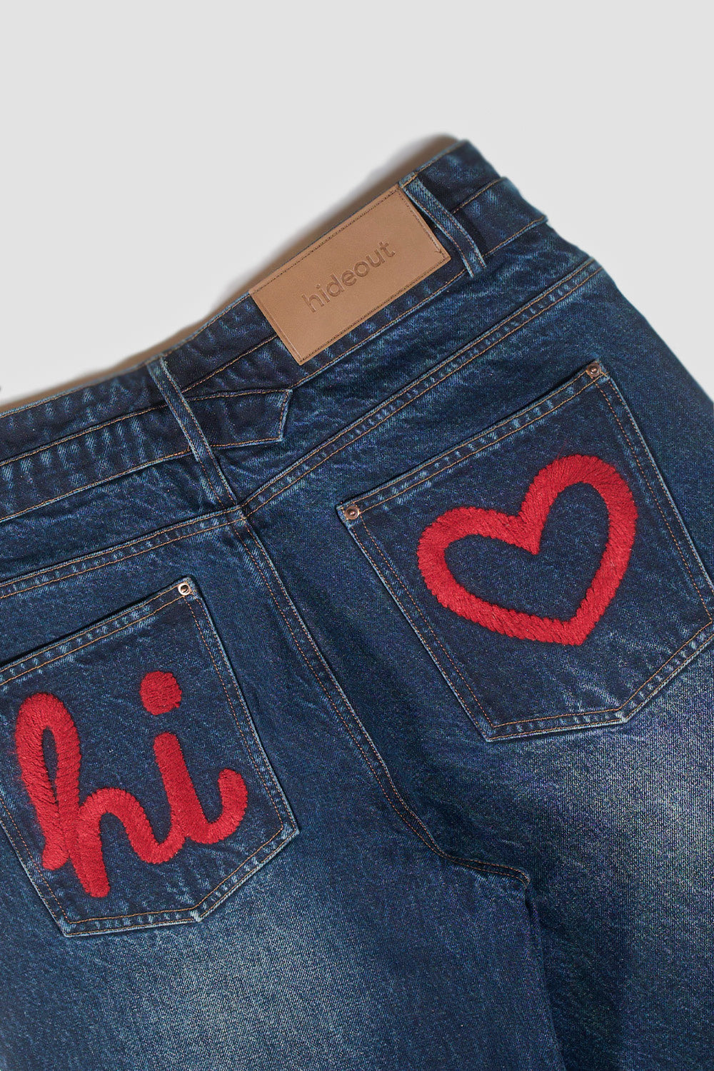 Overlap embroidered pocket jeans from Hideout featuring stylish stitching and classic denim design.